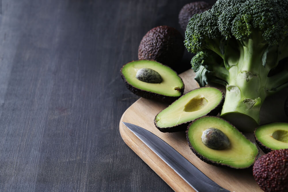 Broccoli and Avo on a cutting board